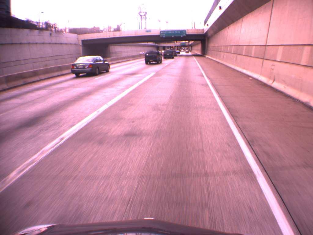 3 Results Figure 3: A scene from the data set The system provides promising results. The algorithm was tested on a urban highway scene. Fig. 3 is a typical image from the data set.