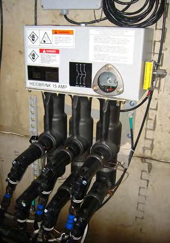 Trident -S Three Phase Switchgear p Fault interrupting Trident-S with wall mounted control box and side mounted operating handle.
