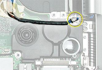 13. Verify that the LVDS cable s bead fits into the metal channel and that the cable is secured into the channel along the right speaker.