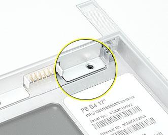 9. Install the memory door screws. Note: Before securing, check that the door edge rests flush and inside the ridge. 10. Replace the battery. 11.