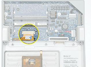 5. Locate the top case flex cable and ZIF connector. 6.