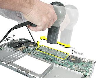 4. Important: To prevent damage to the logic board chips, the thermal material between the logic board and the heatsink must be softened before removing the logic board.