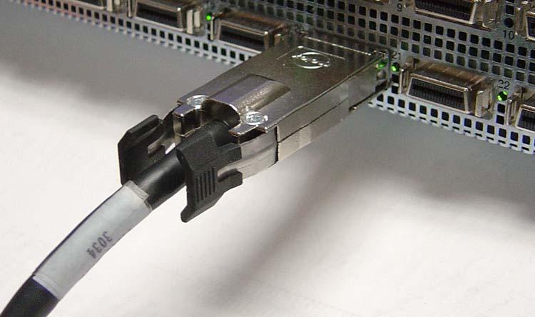 12 Use InfiniBand cables to connect the HCA in your host to the InfiniBand switch card of your Topspin 360.
