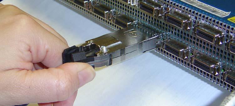 13 To remove a cable with a pinch connector, pinch both sides of the back of the