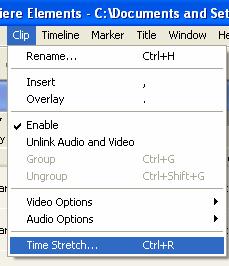 Click on the end of the audio clip, and your selection tool will turn into the red bracket with the black double arrow.