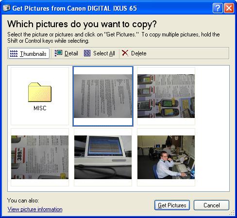 Connect your camera to your computer using your USB cable. 3. Click on the drop down list on the toolbar and select Scan from WIA. 4. Click on the icon.