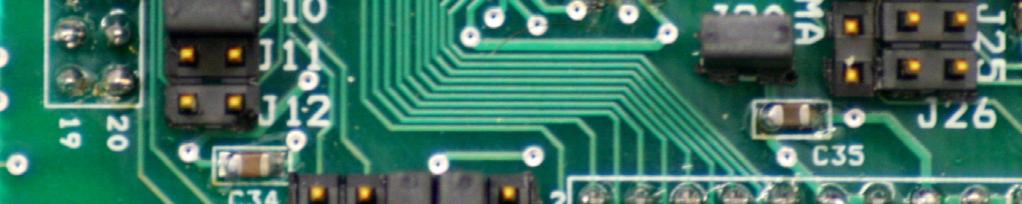 chip. On the daughter board, the analog portion of the chip is biased using TI precision references.