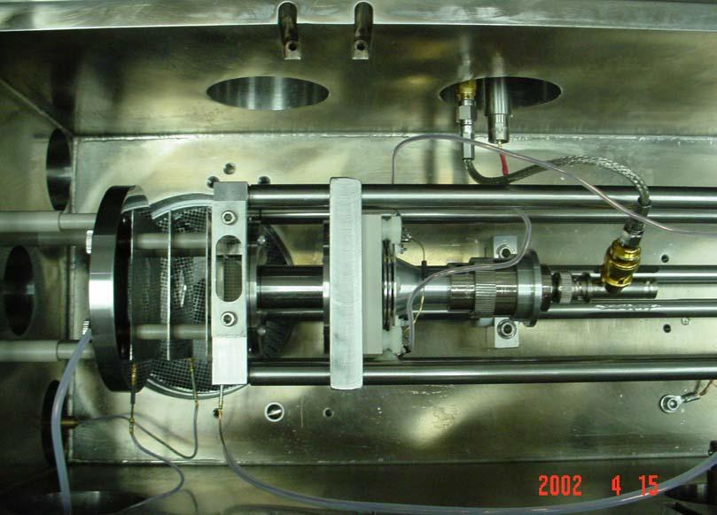 Mass-correlated acceleration (MCA) on a miniaturized instrument On a 4-inch TOF instrument: the ion source is