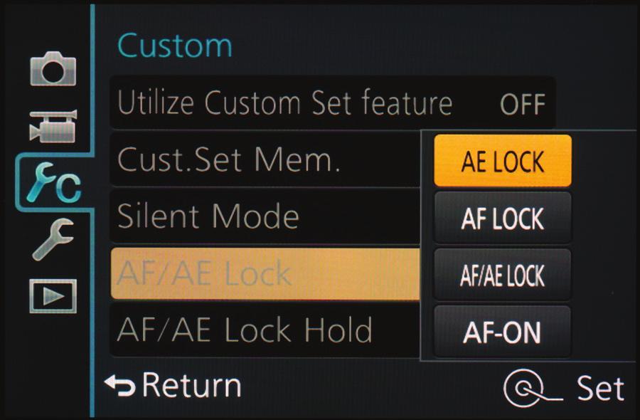 160 Photographer s Guide to the Panasonic Lumix LX100 AF/AE Lock This setting lets you set the function of the AF/AE Lock button, which is located to the right of the red Motion Picture button on the