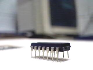 They are the 7400 IC chip which has four 2-input NAND gates, the 7402 IC chip which