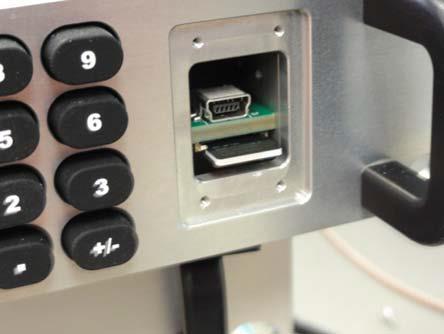 Figure 3: Micro SD Programming Card Inserted into Slot and Locked In 4. Power up the RDMS.