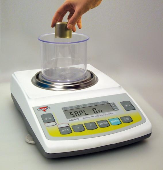 2. Press T to tare the scale. 3. Once the scale has been tared, the scale will display the weight of a previously stored sample.