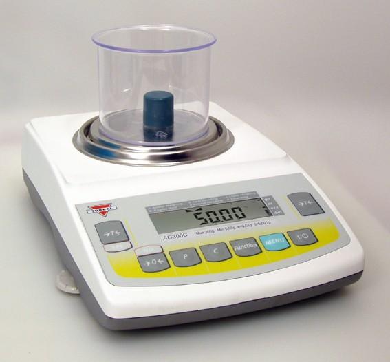 7. After setting the sample weight, the command READY will be displayed. Remove the sample and place the object on the pan.