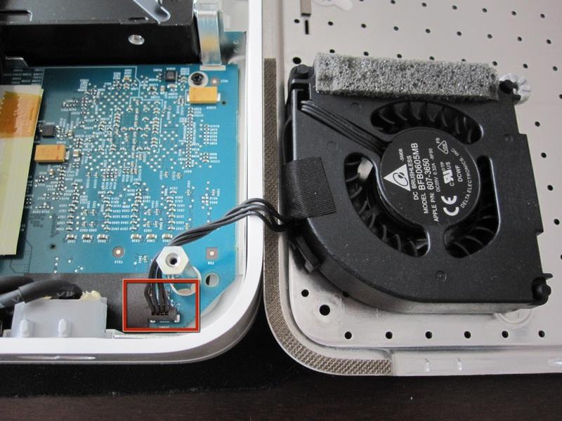 As shown in the second picture, the fan is attached to the metal plate and connected to the logic board next to the power connector.