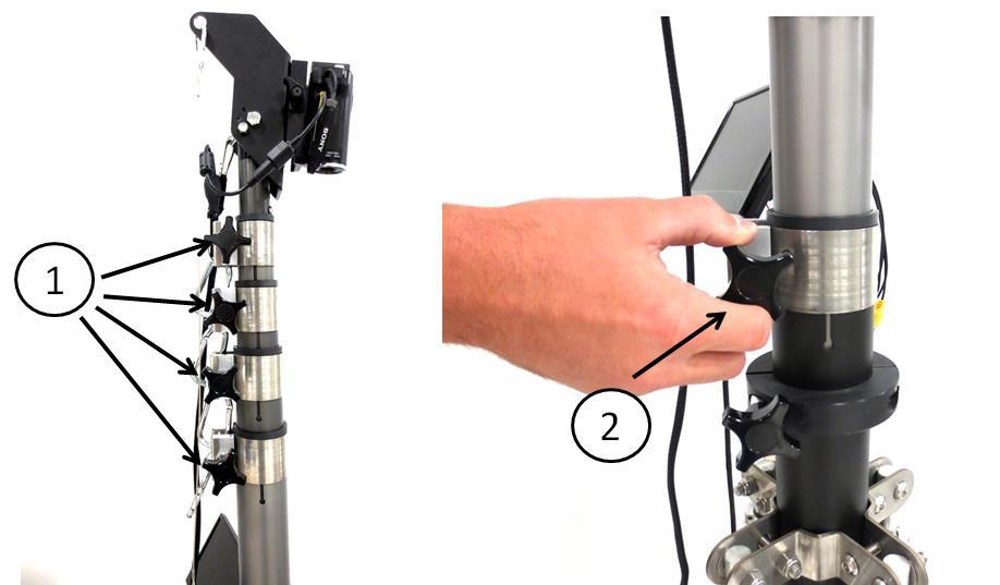 When the first pole section is all the way down, tighten the black knob back into place.