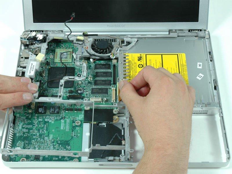 Step 46 Pull back on the orange optical drive cable with one hand, and use your other hand to lift the front