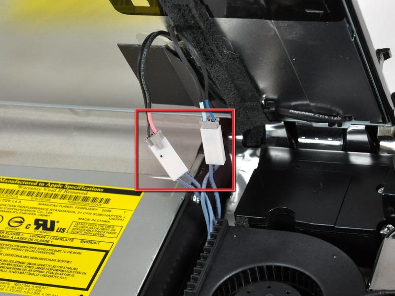 During reinstallation, place the four inverter cable connectors in voids between components