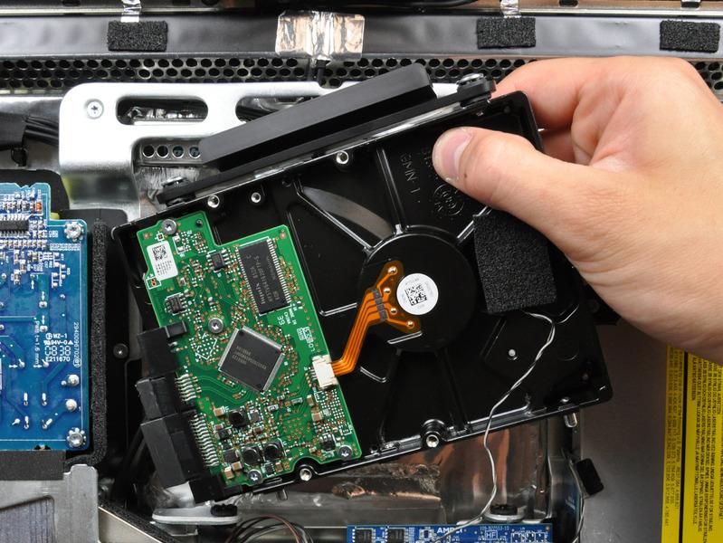 When reinstalling your hard drive, be careful not to push the rubber grommets through the openings