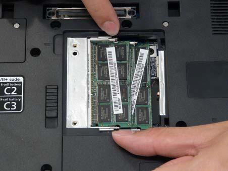 Removing the DIMM Modules 1. See Removing the Battery Pack. 2.
