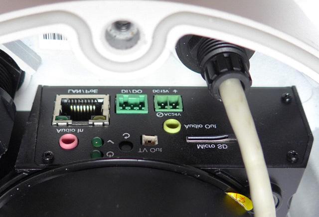 3. Install the Ethernet cable. A. Rotate to remove the indicated cap and the plug inside. B. Thread an Ethernet cable (the end with no RJ-45 connector) from the back panel through the cable gland.