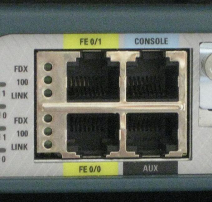 This Router has two ethernet ports (yellow), named FastEthernet 0/0 and FastEthernet 0/1. If only one ethernet port is needed in your exercise, FastEthernet 0/0 should be used.