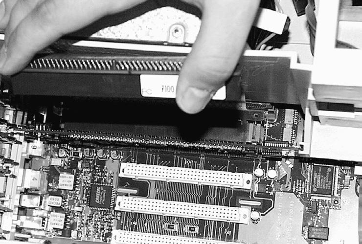 Align the Crescendo card over the PDS slot on the logic board with the card s heatsink facing toward the power supply.