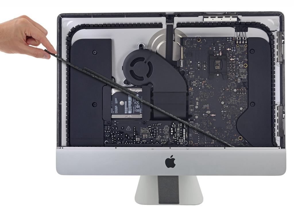 Step 25 Remove the lower support bracket from the imac enclosure.