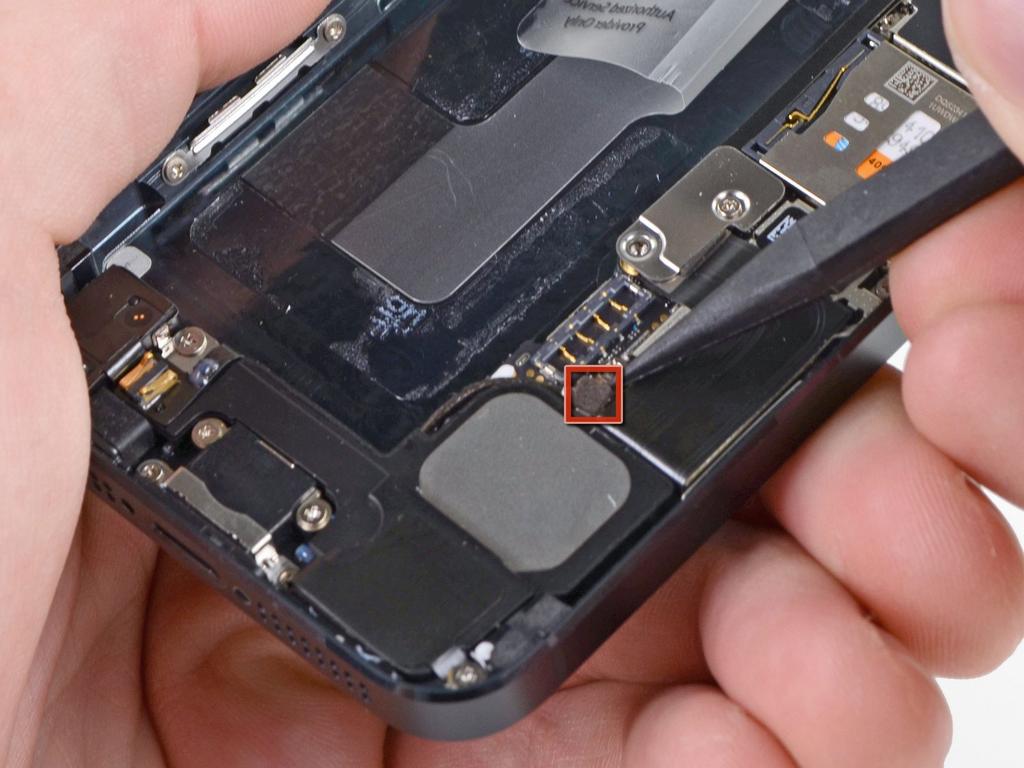 During reassembly, make sure the battery is seated firmly against the rear case.