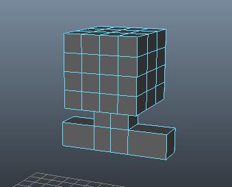 5. Switch back to perspective view and use the extruding tool and extrude down the two center faces on the bottom of the cube to form a neck: Extrude down one
