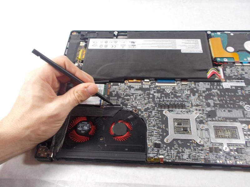 MSI GS63VR 7RF Stealth Pro SSD Replacement Step 7 SSD First, locate all the ribbon cables that are connected to the motherboard.
