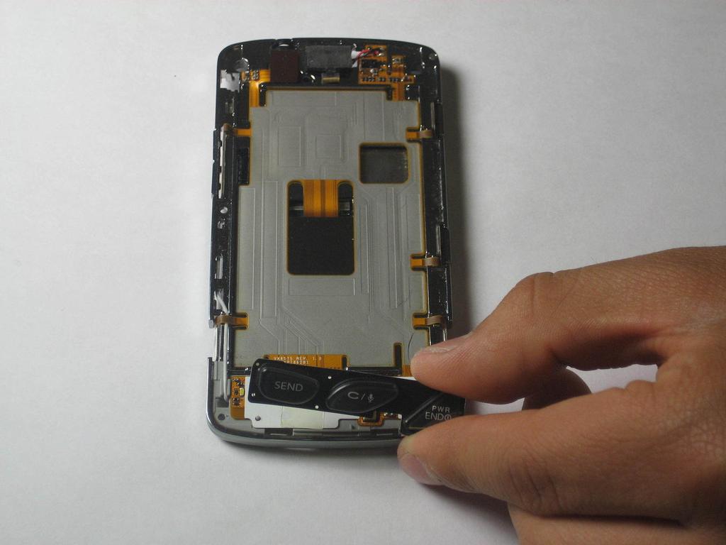 Step 9 Front Buttons With the phone still facing upwards, identify and remove