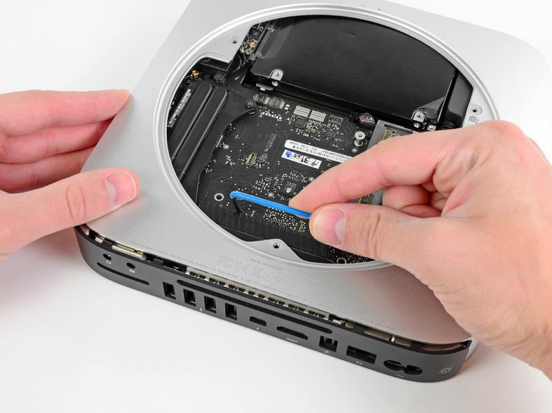 Be sure it makes contact with the top side of outer case below the logic board before proceeding.