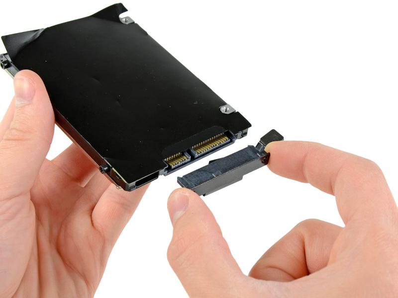 Remove the hard drive cable by pulling its connector