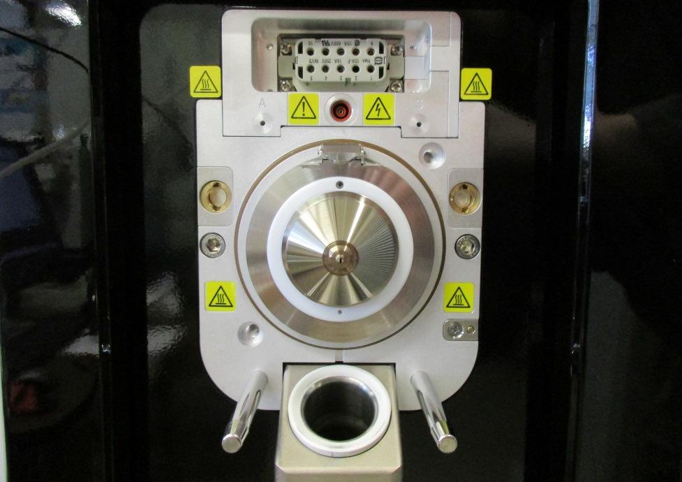 Figure 3: Source region with spray shield removed Attaching the VAPUR Interface Swing the
