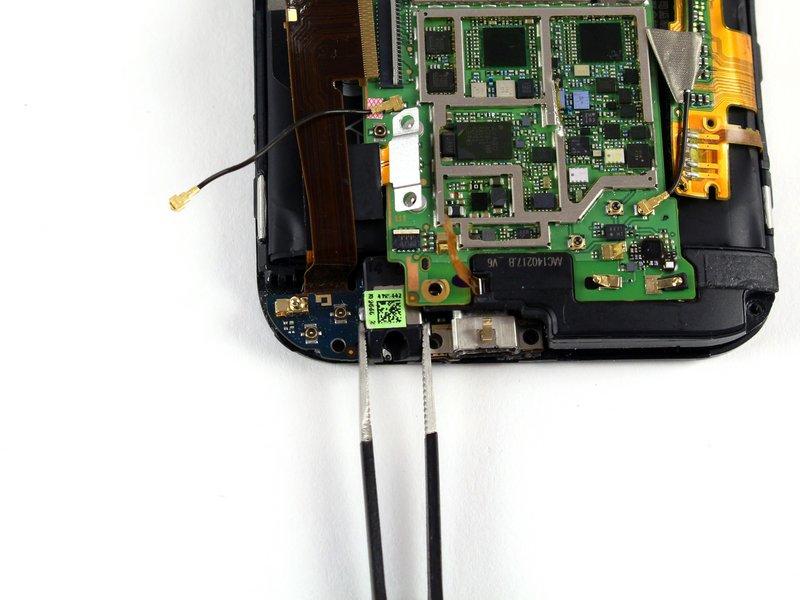 screw securing the headphone jack/micro USB board.