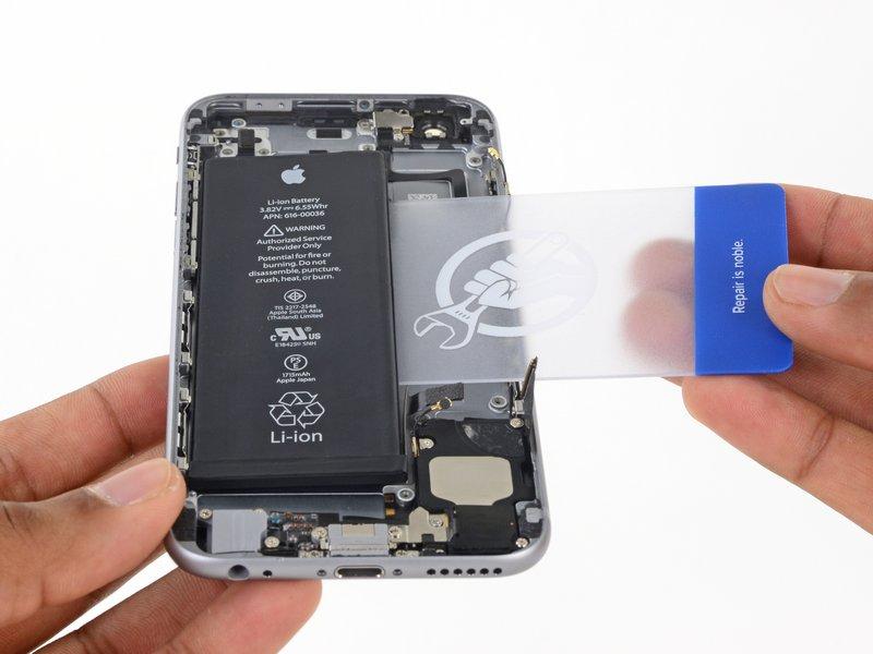 Prepare an iopener and apply it to the back of the rear case, directly over the battery.