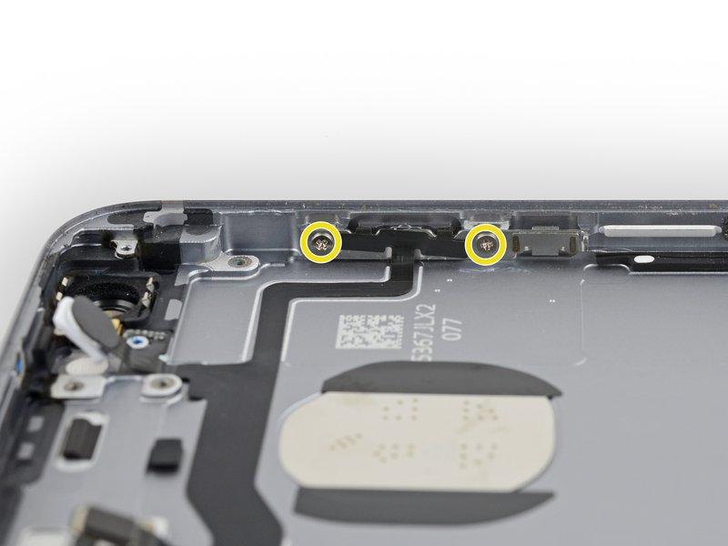1 mm screws set into the right edge of the rear case If you overtighten these screws during reassembly, your power
