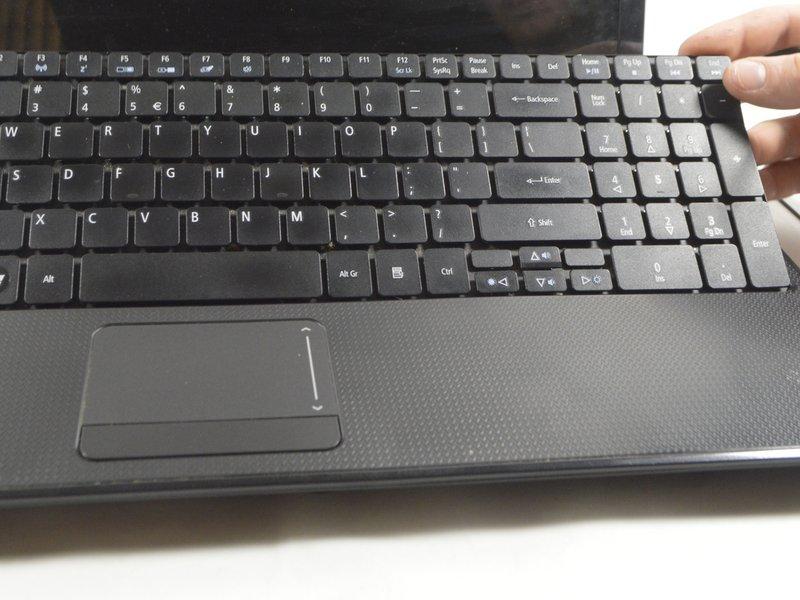 keyboard until the keyboard is able to easily be lifted up out of the laptop Do NOT attempt to fully