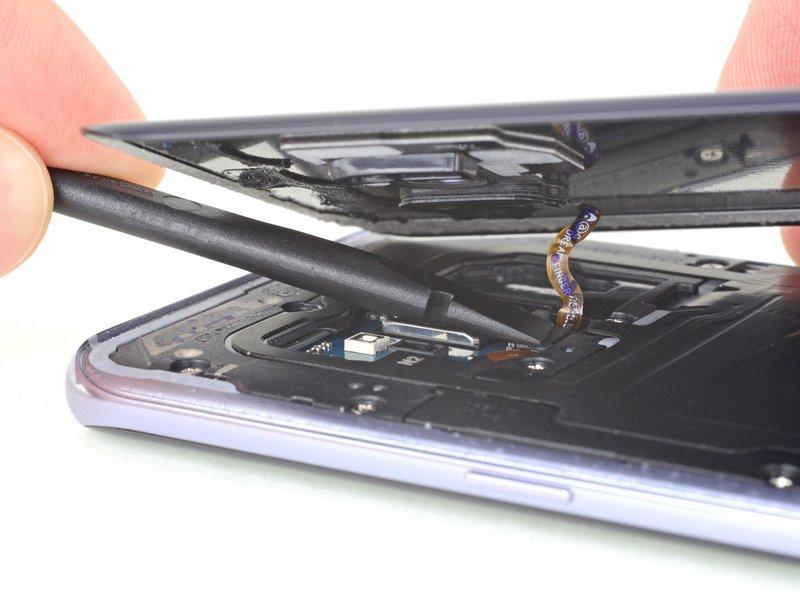 Step 10 During reassembly, in order to reconnect the fingerprint sensor cable, first angle the back cover into position until the cable connector lines up perfectly over its socket.