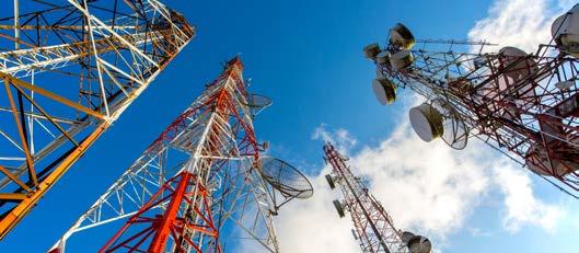 Telecom Background Telecom Tower Infrastructure spreads across the globe for seamless network connectivity. The new generation telecom network (4G, 5G) hosts many IT equipments.