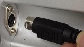 Plug the peel sensor mini DIN cable connector into the