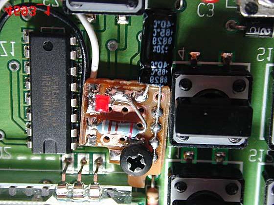 Figure 6 shows TOP VIEW of component layout. NEGATIVE lead of 100 uf 10 volt capacitor is shown soldered to several pads on right side of PC board.