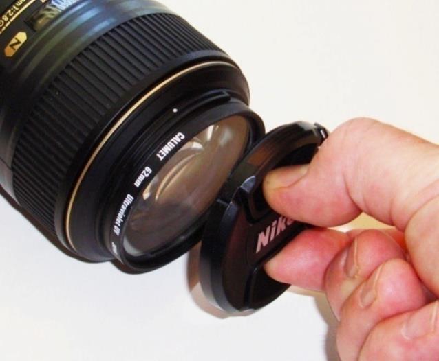 4. Remove lens cap and turn