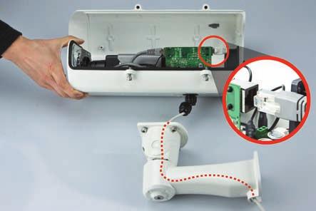 Please note that the whole RJ-45 cable (with the plug) cannot go through the protective cap.