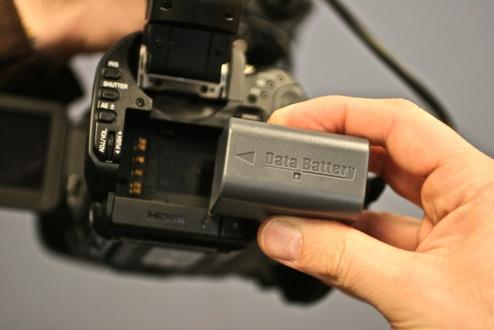 2. OPERATING THE JVC HM100U Turning on the camera First, hold the battery firmly in your hand