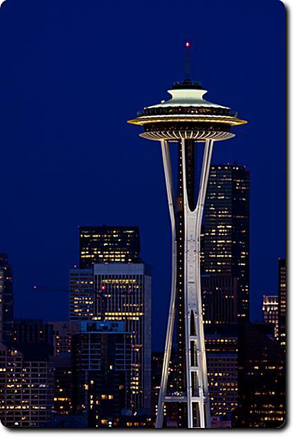 Fun One! During a family vacation, you go to dinner at the Seattle Space Needle. There is a rotating restaurant at the top of the needle that is circular and has a radius of 40 feet.