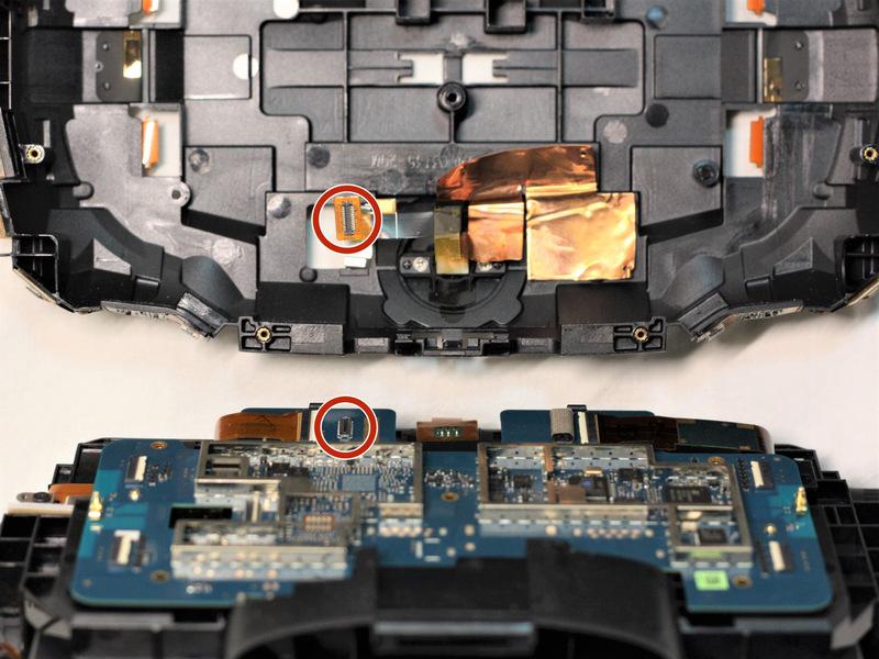 The camera ribbon cable must be pulled out of its socket vertically, as opposed to all other ribbon