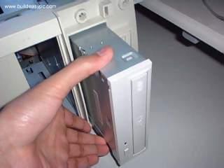 Figure 2 Mount your CD/DVD-ROM drive into its mounting slot. Use the supplied screws to screw the drive into position. Figure 3 Connect the IDE cable to the drives IDE connector.