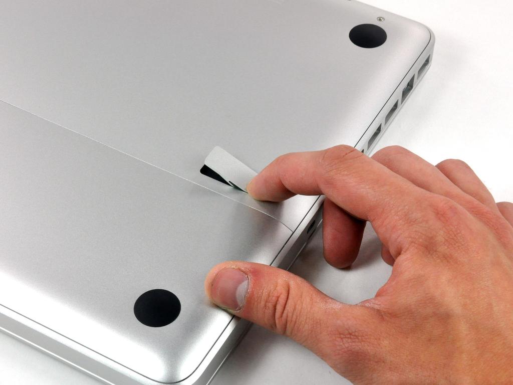 Step 1 Access Door With the case closed, place the Unibody top-side down on a flat