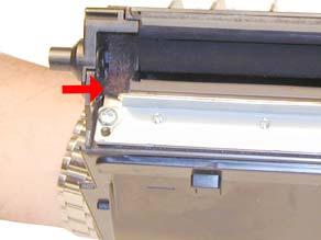 FIGURE 11 FIGURE 12 16. Re-install the static roller, inside end plate first.